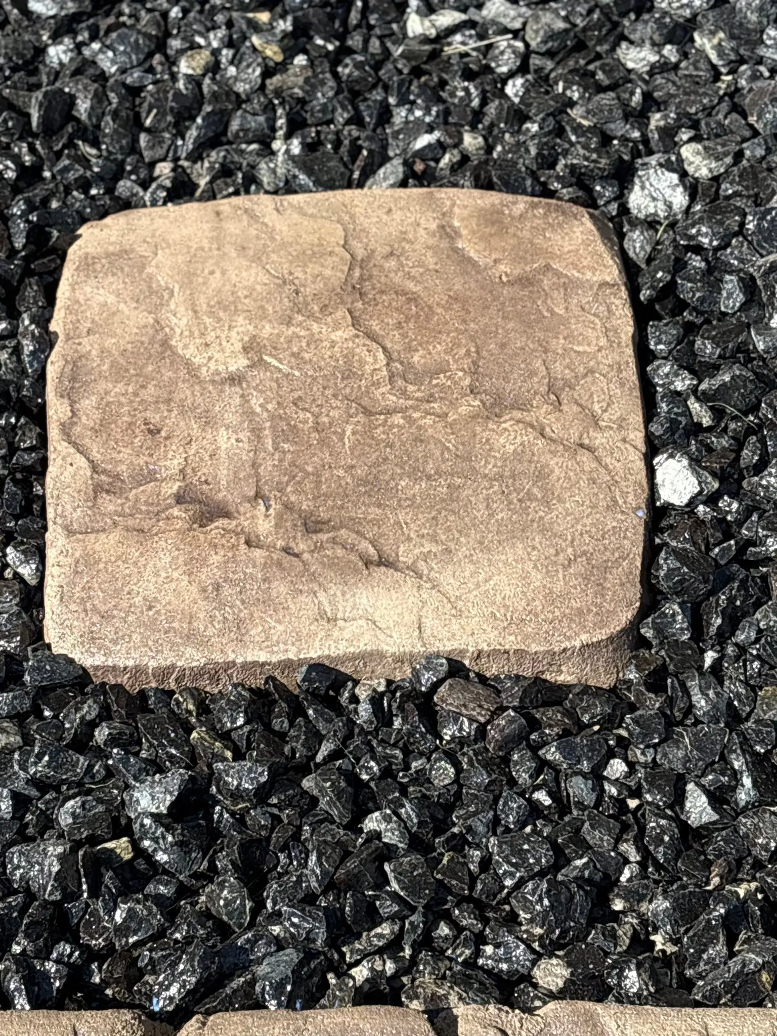 Full-service landscaping with stone, paver and gravel work installed by The Muscle